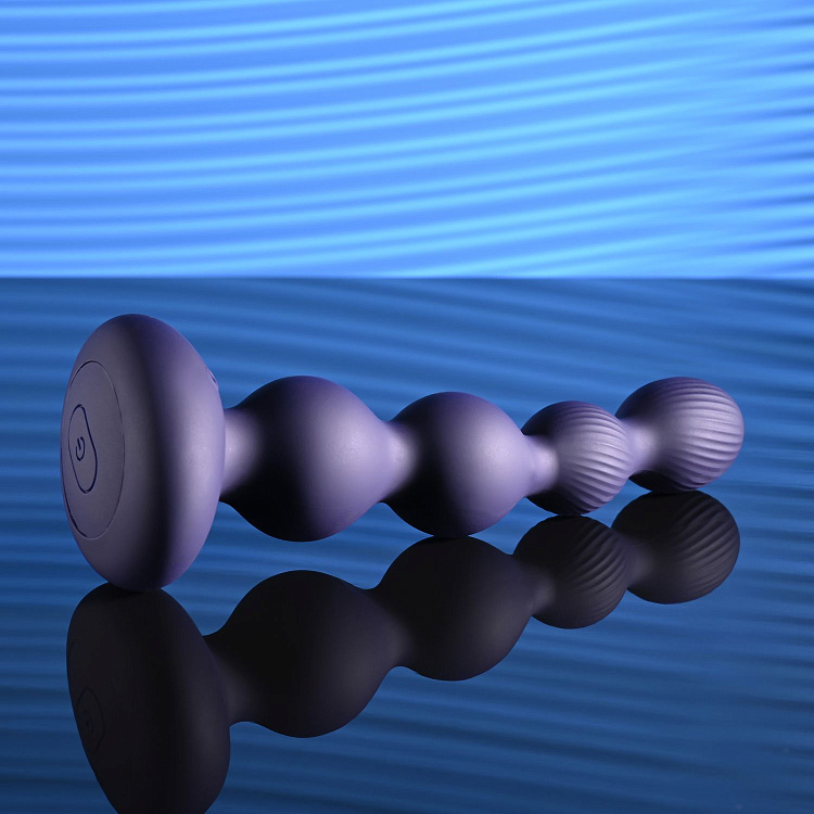 Фиолетовые анальные бусы с вибрацией и вращением Pleasure Orbit - 17,8 см.